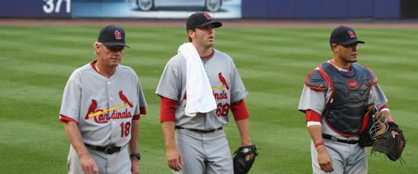 pitching coach Dave Duncan, starting pitcher Mitchell Boggs, and catcher Yadier Molina
