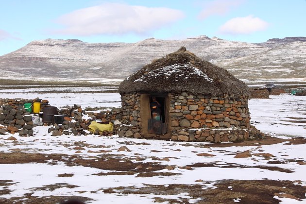A Basotho homestead, on the plateau above Sani Pass, in winter by Adam Riley