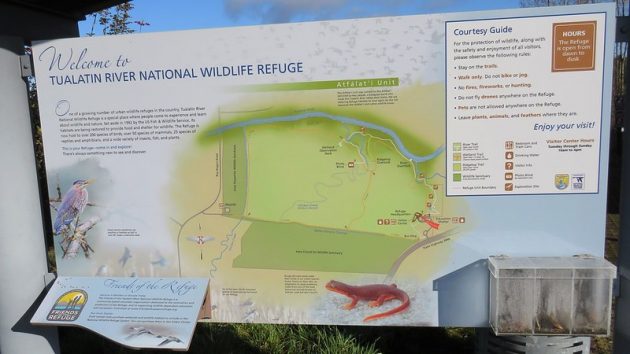 Sign containing an image of a map of the trails and other information at Tualatin River National Wildlife Refuge.